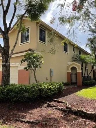 Rent this 4 bed townhouse on 4311 Vineyard Circle in Weston, FL 33332