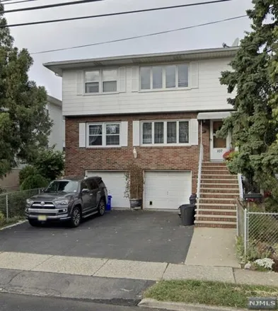 Rent this 3 bed house on 107 Columbus Ave Unit 1 in Garfield, New Jersey