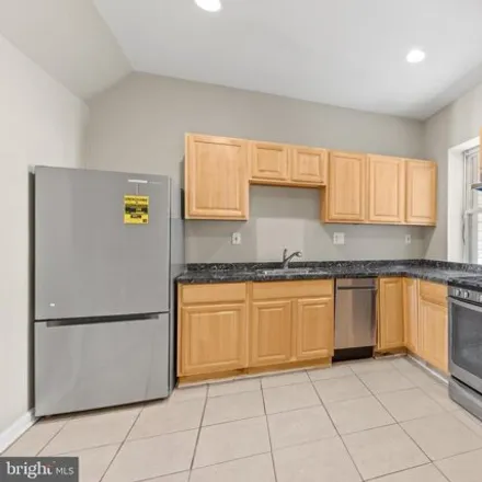 Image 1 - 117 S Calhoun St, Baltimore, Maryland, 21223 - House for sale