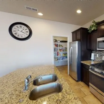 Buy this 4 bed apartment on 6811 Oasis Canyon Road Northwest in Paradise Hills Civic, Albuquerque
