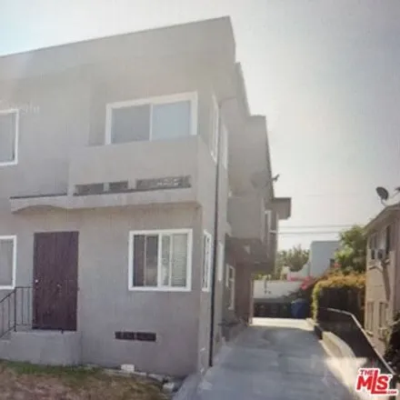 Rent this 2 bed apartment on 2060 South Longwood Avenue in Los Angeles, CA 90016