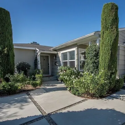 Rent this 2 bed house on 1055 South Rimpau Boulevard in Los Angeles, CA 90019