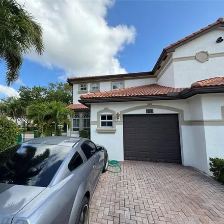Rent this 4 bed townhouse on Darlington Place in Cooper City, FL 33328
