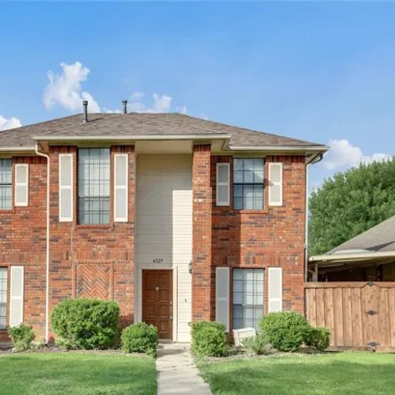 Rent this 3 bed house on 4325 Harvest Hill Rd in Carrollton, Texas