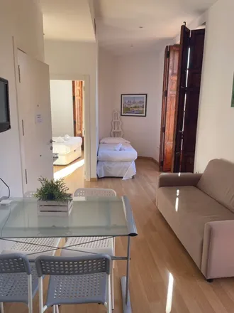 Rent this 2 bed apartment on Hostal El Pilar in Plaça del Mercat, 19