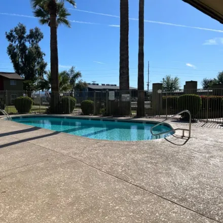 Rent this 2 bed townhouse on 3740 West Camelback Road in Phoenix, AZ 85019