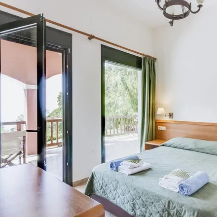 Rent this 4 bed house on Pelekas in Corfu Regional Unit, Greece