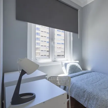 Rent this 14 bed room on Avenida Visconde de Valmor in 1050-070 Lisbon, Portugal