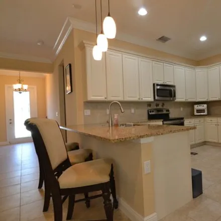 Rent this 3 bed house on Southwest Ambrose Way in Port Saint Lucie, FL
