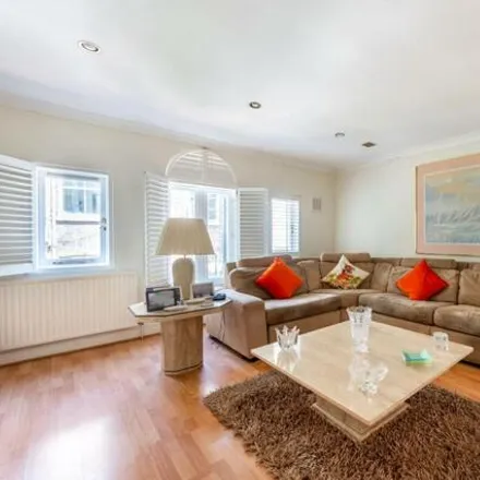 Buy this 3 bed townhouse on 6 Bulmer Mews in London, W11 3NZ