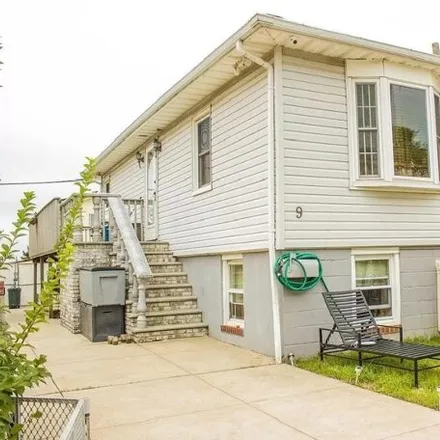 Buy this 4 bed house on 8 Canton Court in New York, NY 11229