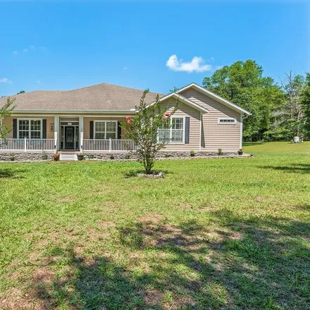 Buy this 4 bed house on 12430 Northwest 206 Terrace in Alachua County, FL 32615