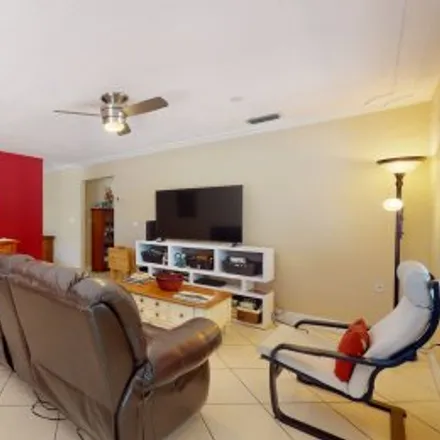 Rent this 3 bed apartment on 62 West 44th Street in Andrews Park, Hialeah