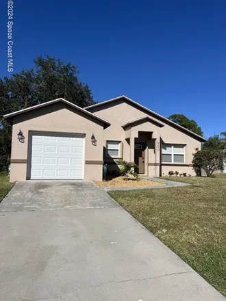 Rent this 3 bed house on 950 Bermuda Ave in Sebastian, Florida