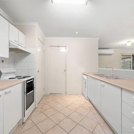Rent this 4 bed apartment on 105 Castile Crescent in Edens Landing QLD 4205, Australia