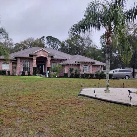 Buy this 4 bed house on 3000 Higate Drive in Deltona, FL 32738