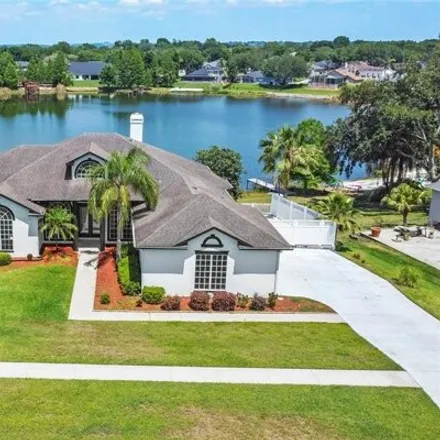 Buy this 4 bed house on 11210 Lake Katherine Circle in Clermont, FL 34711