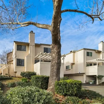 Buy this 2 bed condo on Swallows Nest Country Club in 2245 Orchard Lane, Sacramento