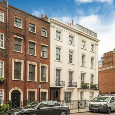 Buy this 3 bed townhouse on 70 Park Street in London, W1K 2JS