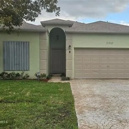 Buy this 3 bed house on 2383 Northwest 7th Court in Fort Lauderdale, FL 33311