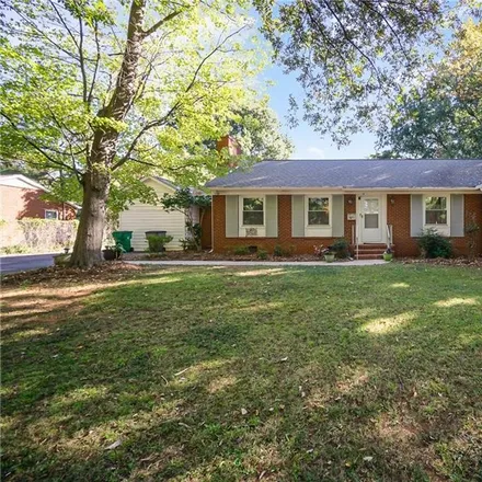 Buy this 4 bed house on 1041 Scaleybark Road in Charlotte, NC 28209