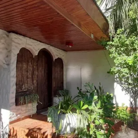 Buy this 3 bed house on Carolina Muzzilli in Partido de Lomas de Zamora, B1836 CXJ Llavallol