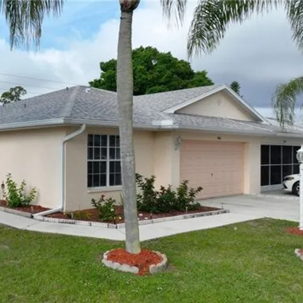 Buy this 3 bed house on 456 Bethany Village Cir in Lehigh Acres, Florida