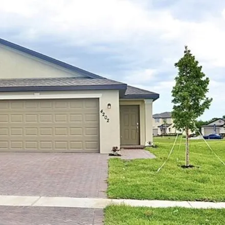 Rent this 4 bed house on 4226 Longmour Lane in Fort Pierce, FL 34947