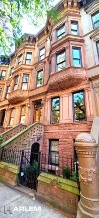 Buy this 7 bed townhouse on 78 West 120th Street in New York, NY 10026