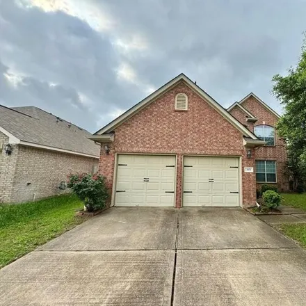 Rent this 4 bed house on 921 Merlin Roost in Harris County, TX 77494