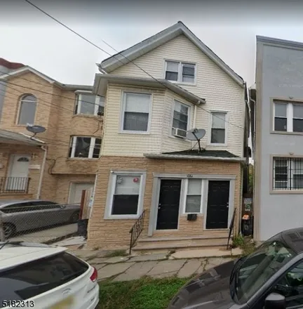 Buy this 4 bed townhouse on 1018 Magnolia Avenue in Elizabeth, NJ 07201