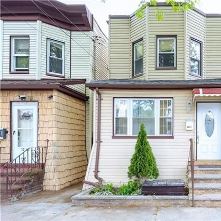 Buy this 3 bed house on 80-43 87th Road in New York, NY 11421