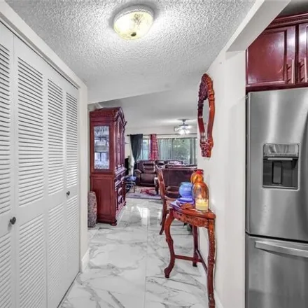 Buy this 2 bed condo on Colony West Golf Club - Championship Course in 6800 North Pine Island Road, Tamarac