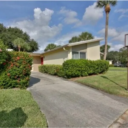 Rent this 2 bed house on 101 Whispering Sands Drive in Bailey Hall, Siesta Key