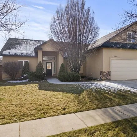 Buy this 4 bed house on 1295 E Lake Creek Dr in Meridian, Idaho