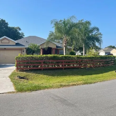 Buy this 4 bed house on 6155 Bayport Drive in Poinciana, FL 34758