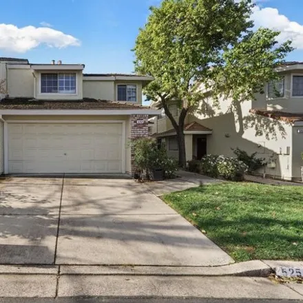 Buy this 3 bed townhouse on 5258 Pebble Glen Drive in Concord, CA 94521