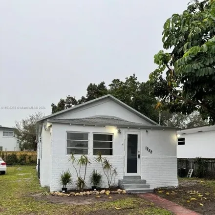 Buy this 4 bed house on 1252 Northwest 69th Street in Liberty Square, Miami