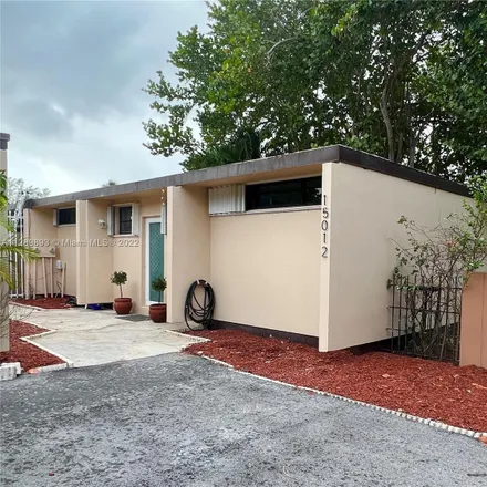 Rent this 2 bed townhouse on 15012 Royal Palm Avenue in Miami Lakes, FL 33014