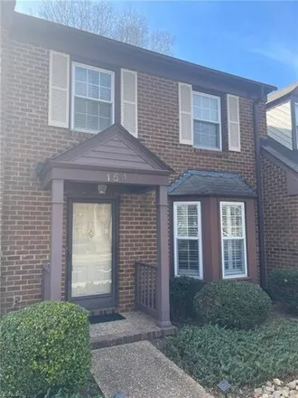 Rent this 2 bed townhouse on 154 Kenilworth Drive in Port Warwick, VA 23606