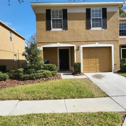 Rent this 3 bed townhouse on 4140 Winding River Way in Land O Lakes, Florida