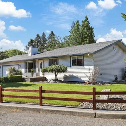 Buy this 4 bed house on 22682 East Wellesley Avenue in Otis Orchards-East Farms, Spokane County
