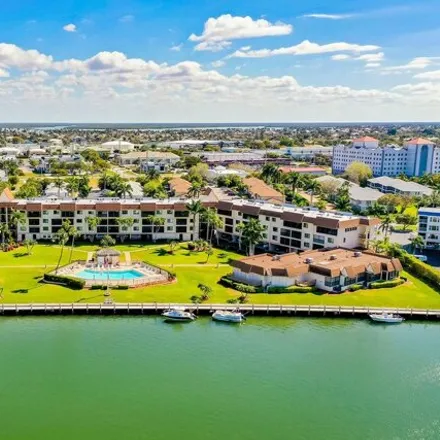 Buy this 2 bed condo on 672 West Elkcam Circle in Marco Island, FL 34145