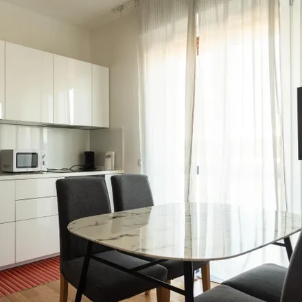 Rent this 1 bed apartment on Welcoming one-bedroom flat near Bande Nere metro station  Milan 20146
