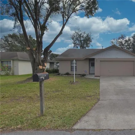 Rent this 2 bed house on 871 Sunshine Way Southwest in Tranquility Park, Winter Haven