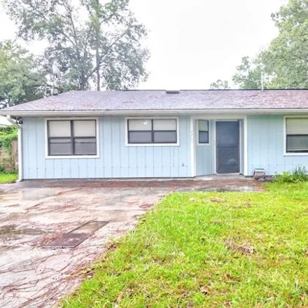 Buy this 4 bed house on 2299 Northwest 42nd Avenue in Gainesville, FL 32605