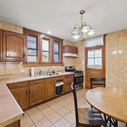 Image 6 - 5625 W Wilson Ave, Chicago, Illinois, 60630 - House for sale