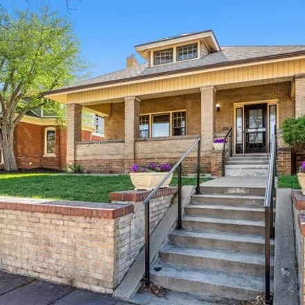 Buy this 4 bed house on 3035 Lowell Boulevard in Denver, CO 80211