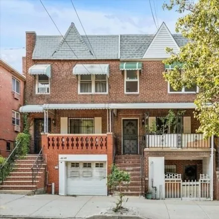 Buy this 6 bed house on 83-07 57th Avenue in New York, NY 11373