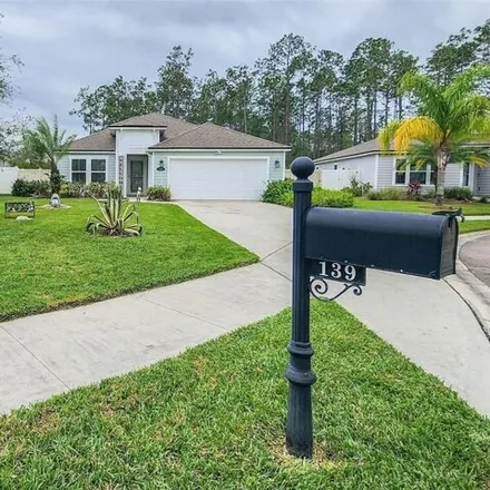 Buy this 4 bed house on 199 Crepe Myrtle Court in Palm Coast, FL 32164
